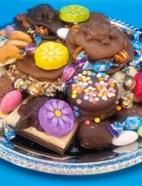 Handmade Chocolate Trays with spring colored candies and chocolates.