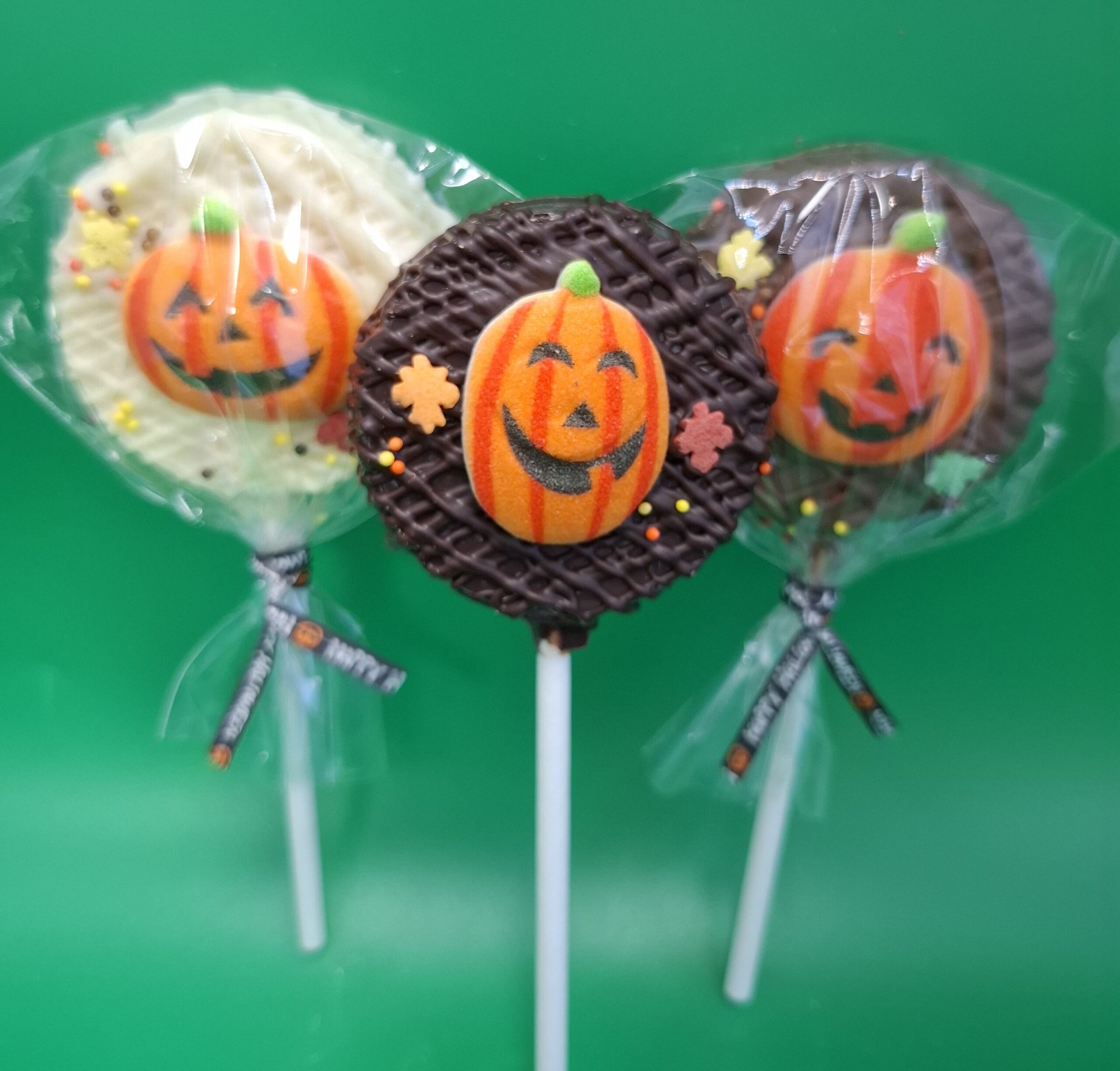 Gourmet Chocolate Pumpkin Lollipop in white, milk, and dark chocolate