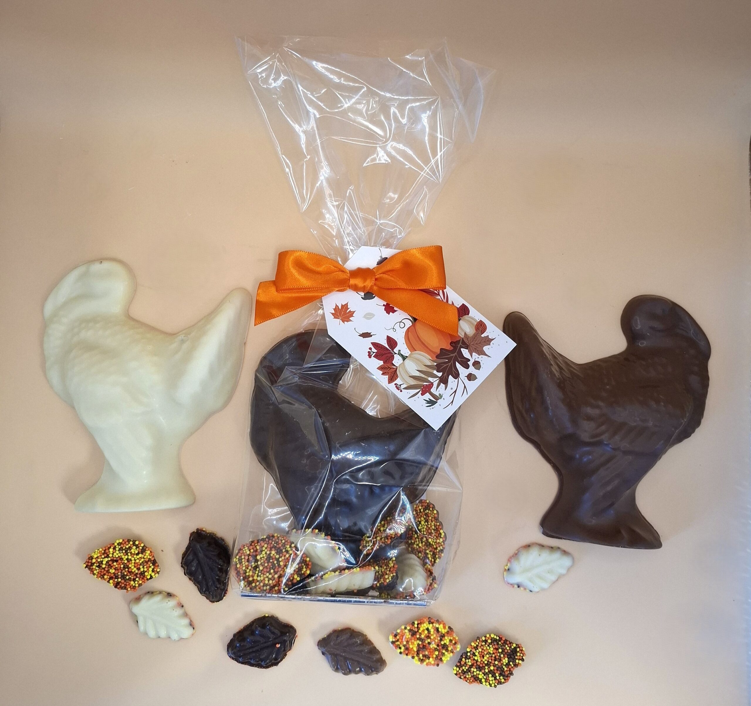 Gourmet Chocolate Turkey - Thanksgiving Table favors in Milk, white and dark chocolate turkeys with homemade nonpareils shaped as leaves.