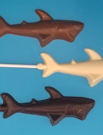Chocolate Shark lollipops in milk, dark and white chocolate