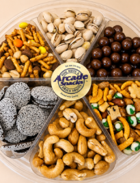 Arcade Favorites Gourmet Gift Tray is a six section tray of snacks, chocolates, and nuts