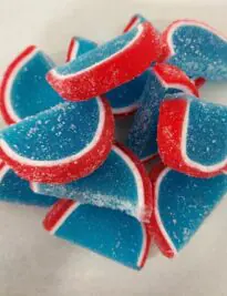 Large jelly slices in blue with red rind.