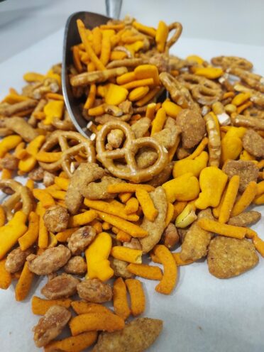 Crunchy Nacho Mix with pretzels, cheddar whales, honey sesame chips, peanuts