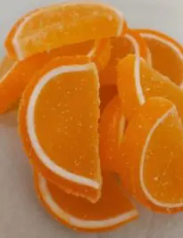 Orange in color large jelly slices with white rind