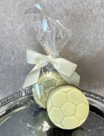 White Chocolate Covered Oreo Soccer Ball Cookies with bow.