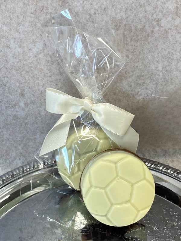 White Chocolate Covered Oreo Soccer Ball Cookies with bow.