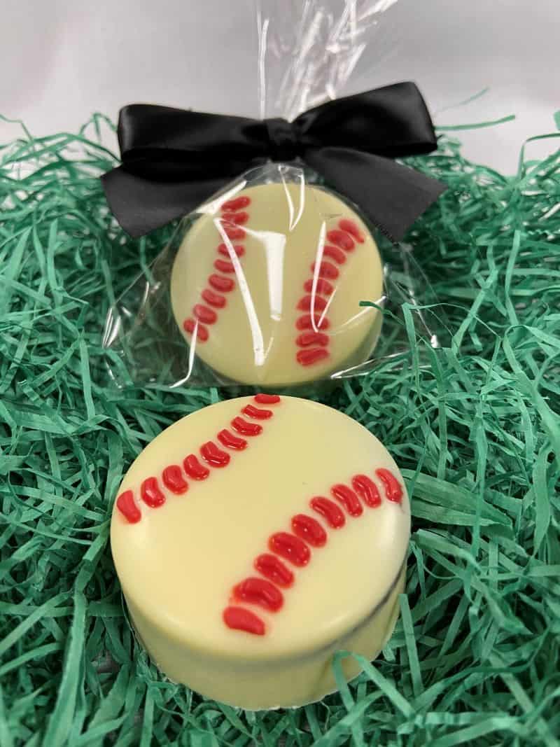 White chocolate covered oreo baseball with red stitching