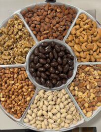 Premium Nut Platter of almonds, pistachios. dark chocolate, cashews, peanuts, and nut mix.