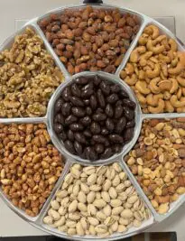 Premium Nut Platter of almonds, pistachios. dark chocolate, cashews, peanuts, and nut mix.