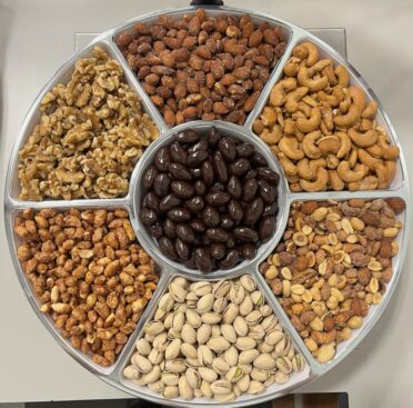 Premium Nut Platter of almonds, pistachios. dark chocolate, cashews, peanuts, and nut mix.