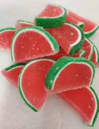 Large jelly slices in pink with green rind.