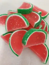 Large jelly slices in pink with green rind.