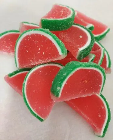 Large jelly slices in pink with green rind.