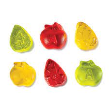 Red, yellow and green gummies shaped like apples and leaves