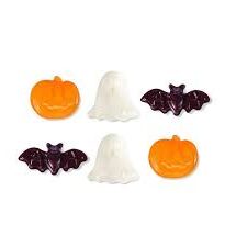 Orange, white and black gummies shaped like bats, ghosts and pumpkins.