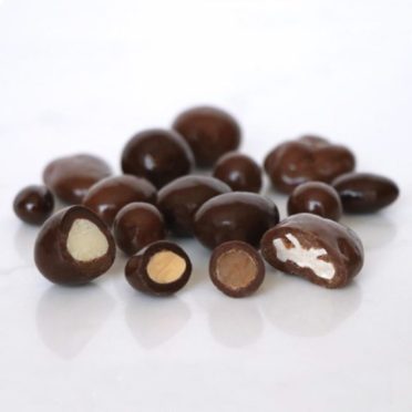 A medley of milk and dark chocolate covered nuts, fruit and sweets